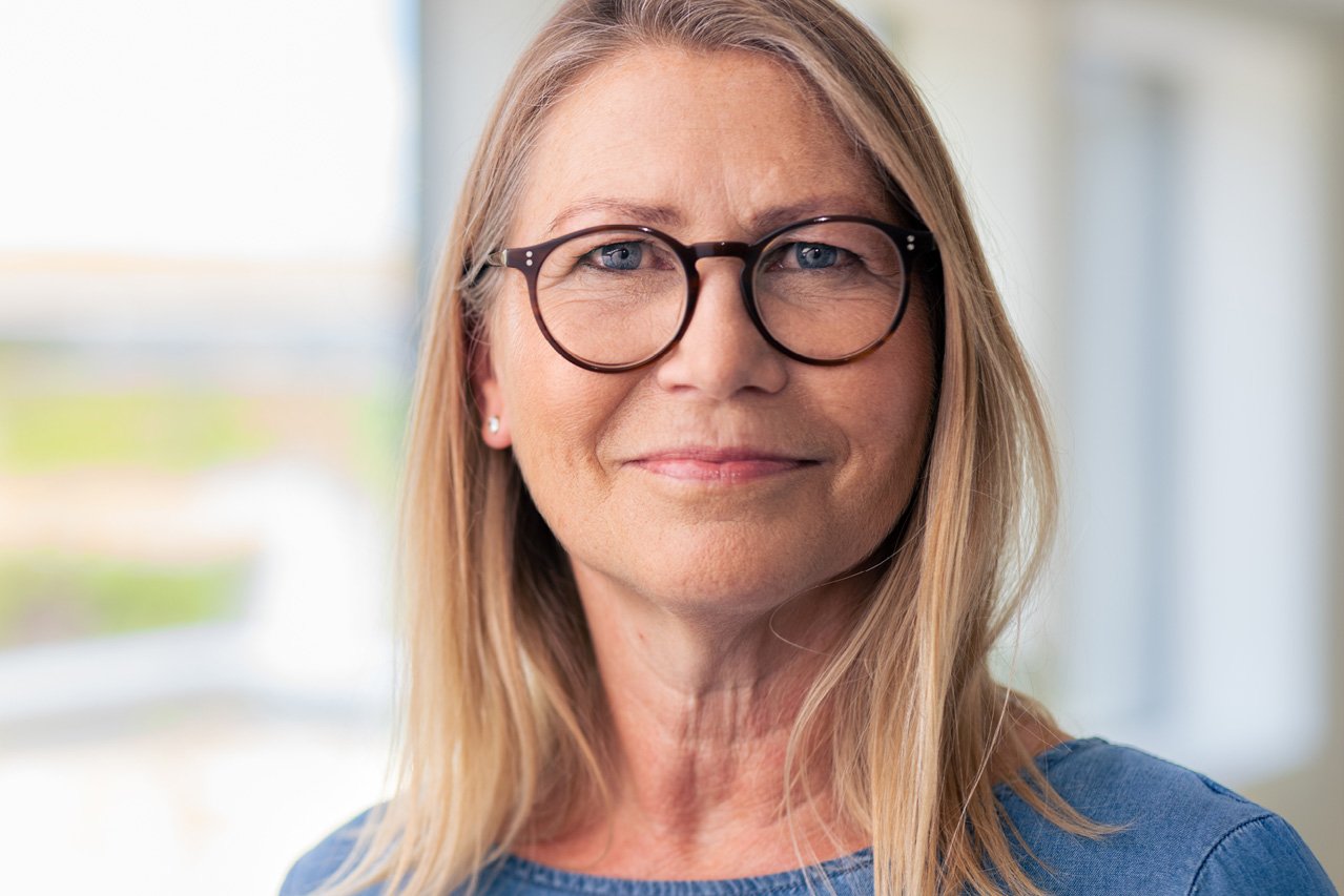 Ihre Vorteile Porträtaufnahme einer Mitarbeiterin des Augustinum