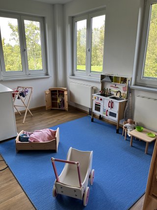 Lernen und Spaß in der Puppenecke Lernen und Spaß in der Puppenecke