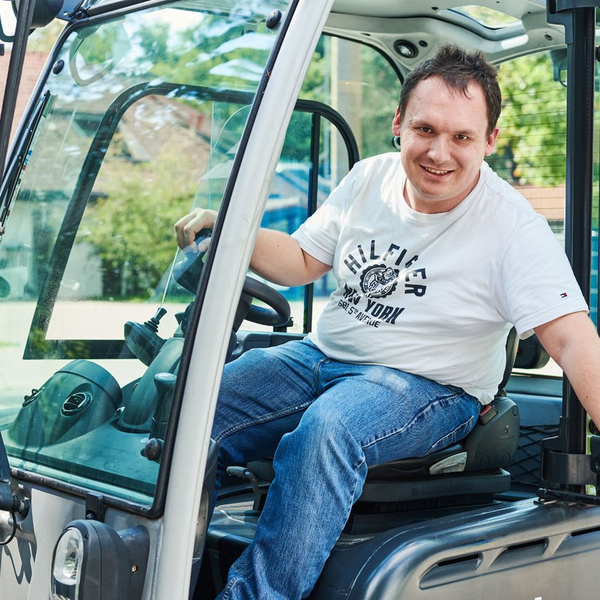 Gabelstapler Ein Klient sitz in einem Gabelstapler