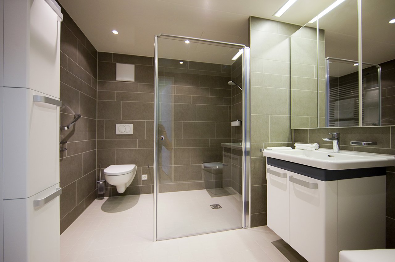 Moderne Designer-Bäder mit barrierefreier Dusche gehören zu jedem Appartement. Moderne Designer-Bäder mit barrierefreier Dusche gehören zu jedem Appartement.